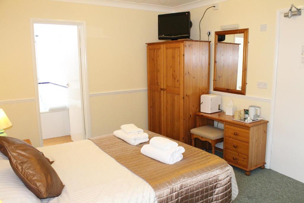Отель The Devon Court Торки Номер фото